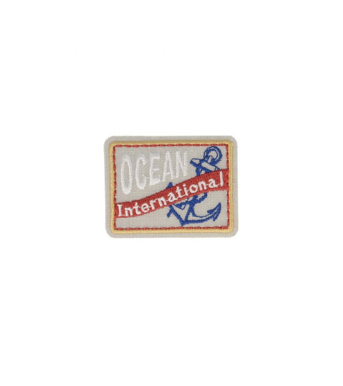 Ecusson thermocollant océan international 4,5x3,5cm