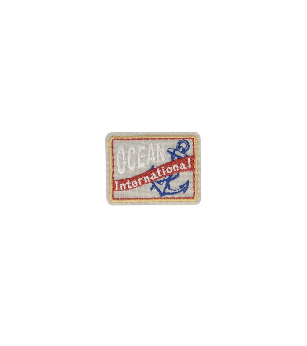 Ecusson thermocollant océan international 4,5x3,5cm