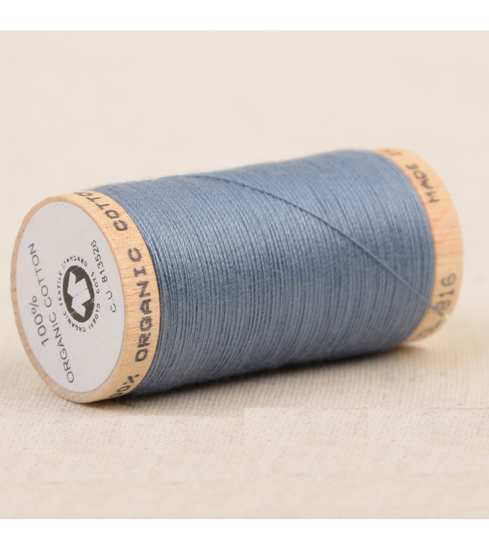 Spool of 100% organic cotton thread 275m mineral blue