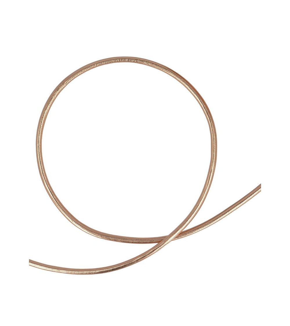 Spool of faux metal cord in rose gold
