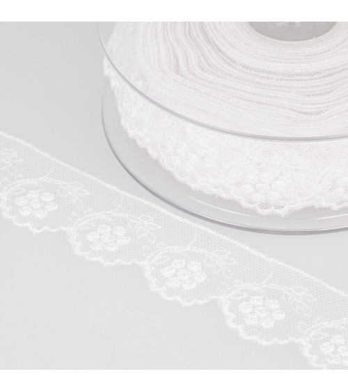 Tulle brodé fleurs 32mm blanc au mètre