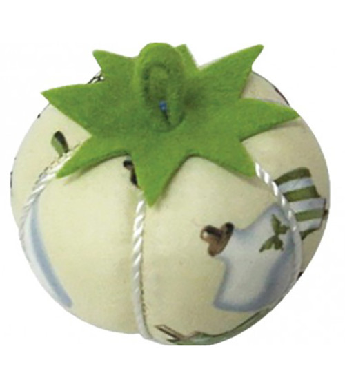 Tomatoes pin holder mannequin on beige background