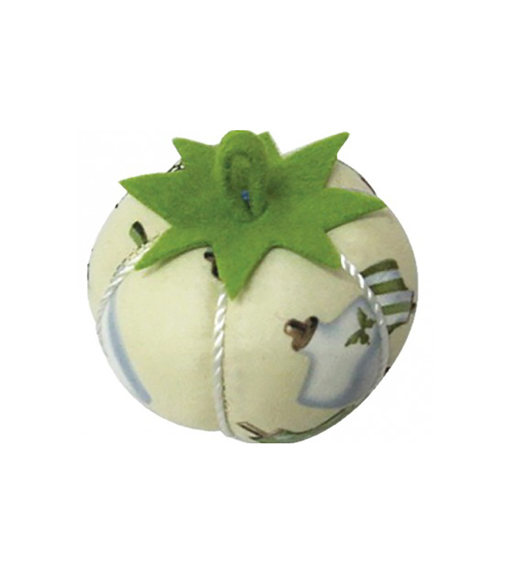 Tomatoes pin holder mannequin on beige background