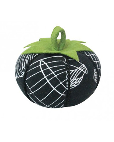 Tomatoes wearing white mannequin pins on black background