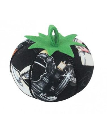 Pin holder tomatoes sewing machine black background
