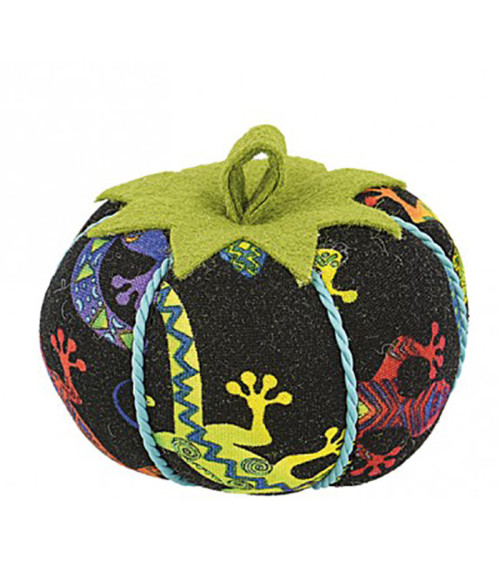 Tomatoes pin holder lizards black background