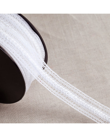 30m spool of lace between two white 30mm crosspieces made in Europe