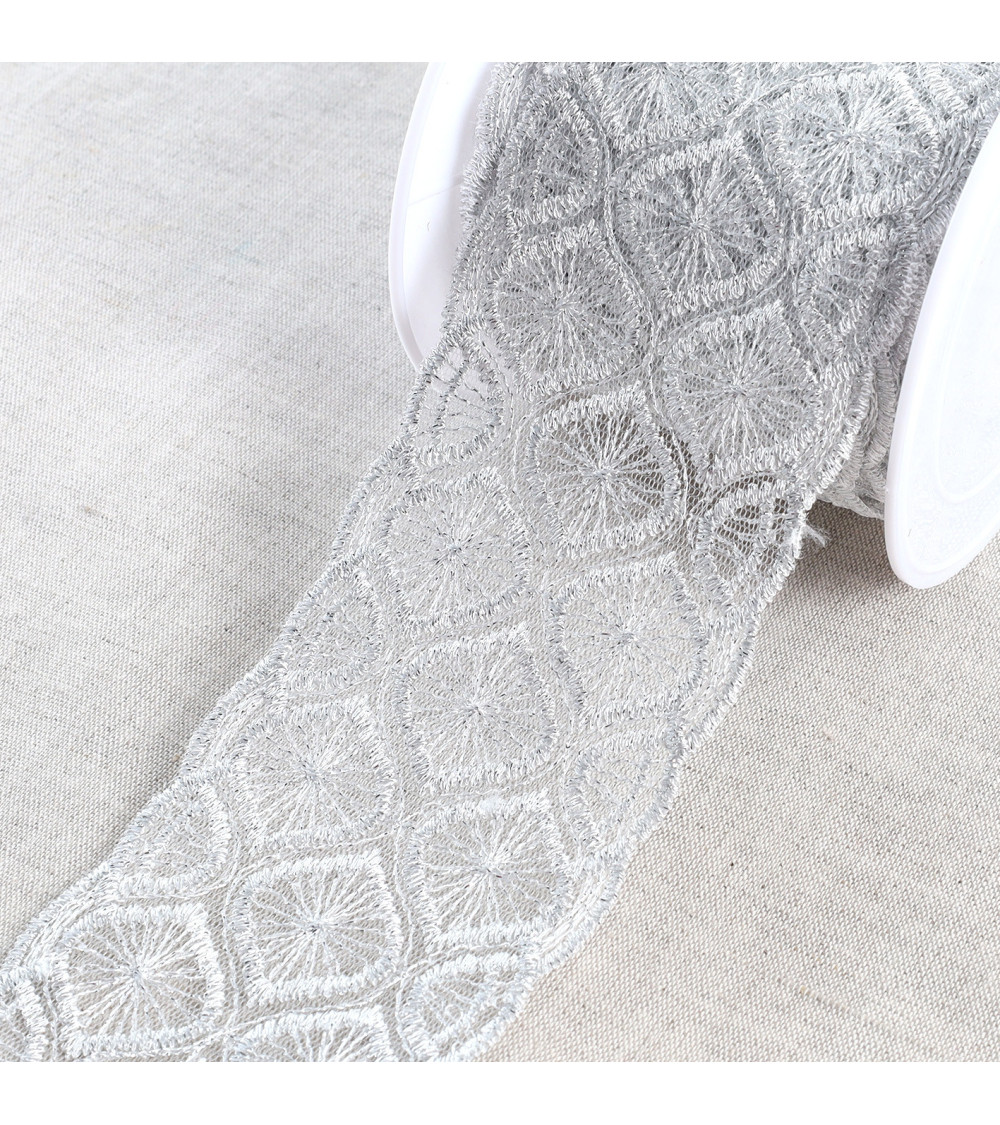 Metallic embroidery on 70mm silver tulle per meter