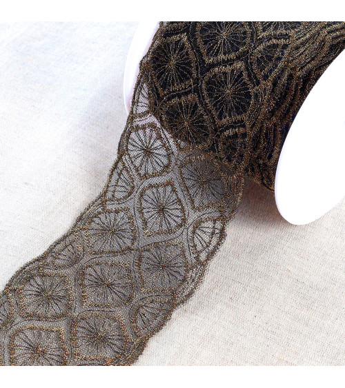 Metallic embroidery on 70mm black/gold tulle per meter