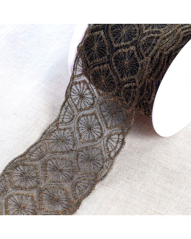 Metallic embroidery on 70mm black/gold tulle per meter
