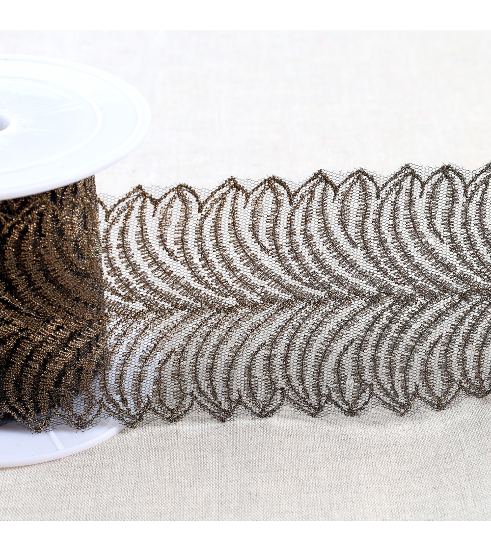 Metallic embroidery on 80mm black/gold tulle per meter