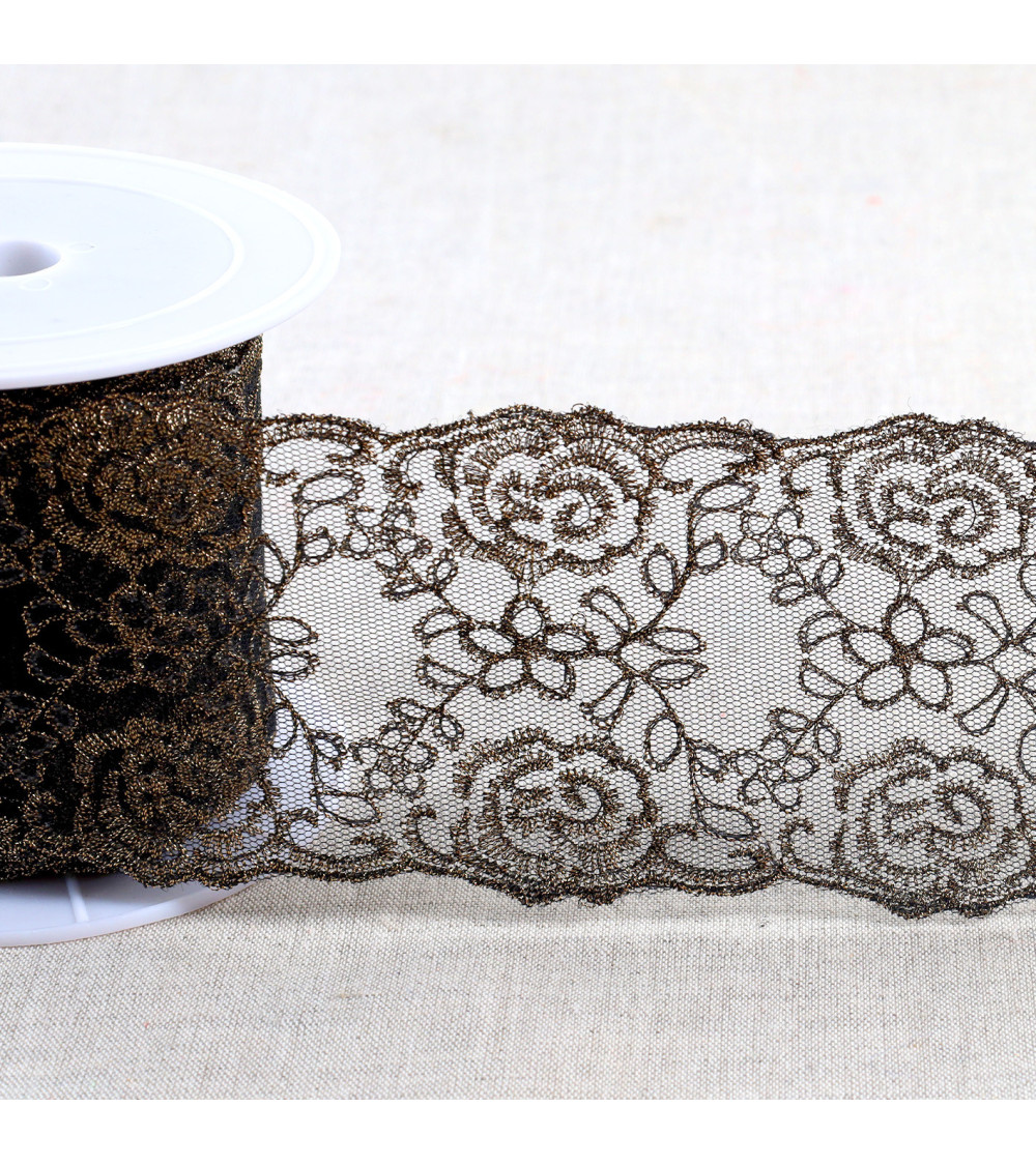 Metallic embroidery on 80mm black/gold tulle per meter