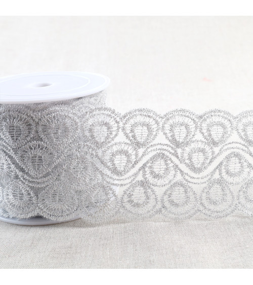 Metallic embroidery on 80mm silver tulle per meter