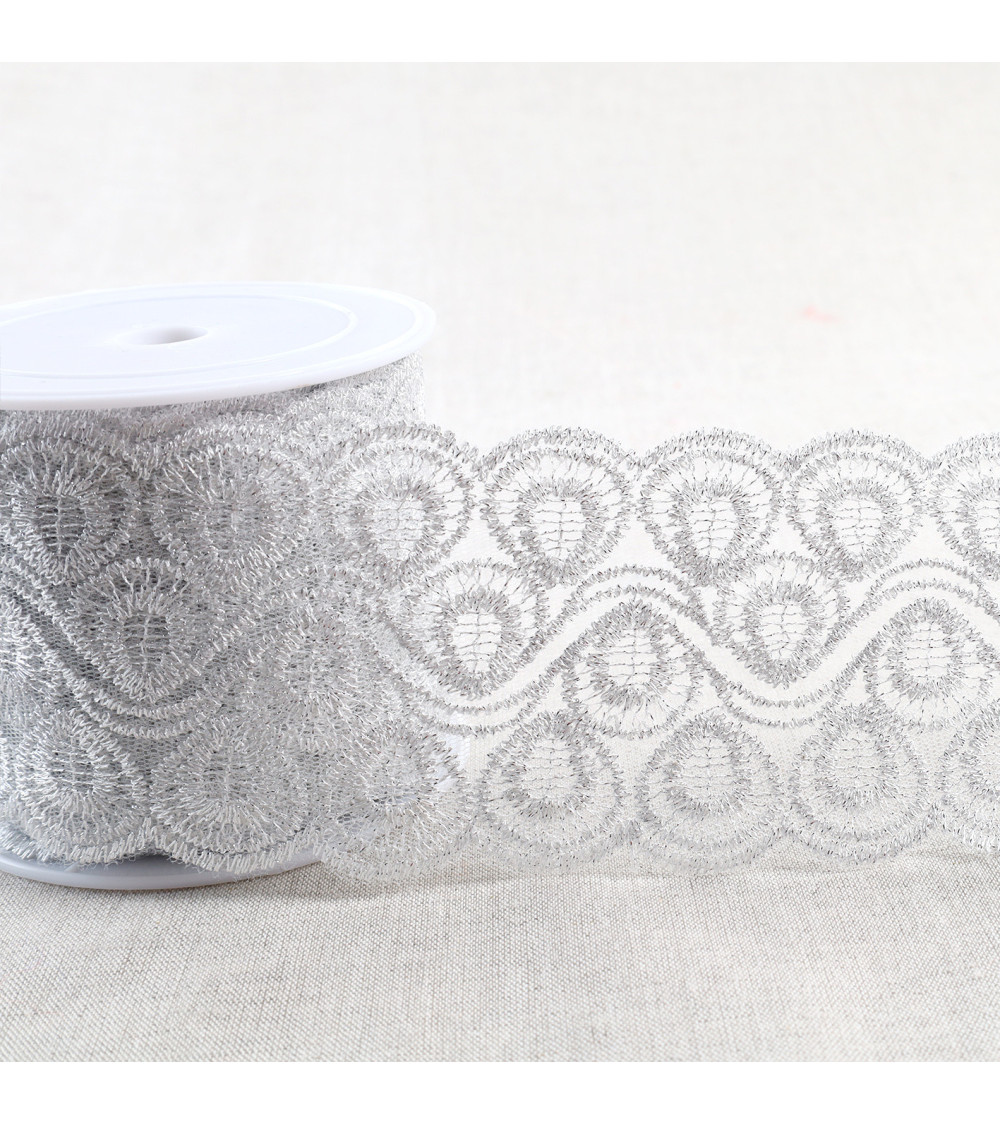 Metallic embroidery on 80mm silver tulle per meter