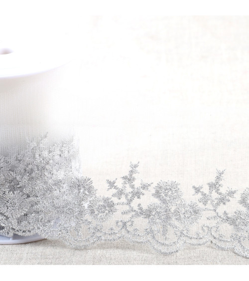 Metallic embroidery on 90mm silver tulle per meter