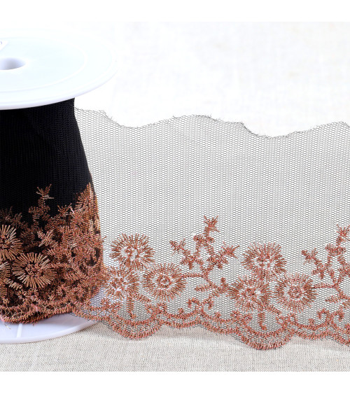 Metallic embroidery on 90mm black/gold/pink tulle per meter