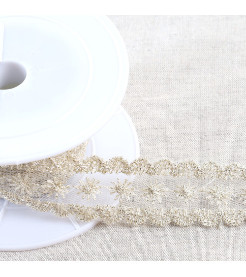Metallic embroidery on 28mm gold tulle per meter