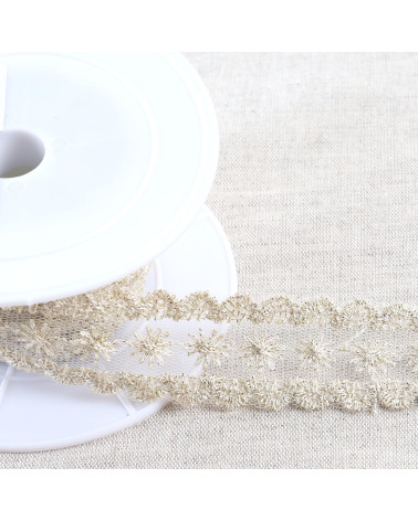 Metallic embroidery on 28mm gold tulle per meter