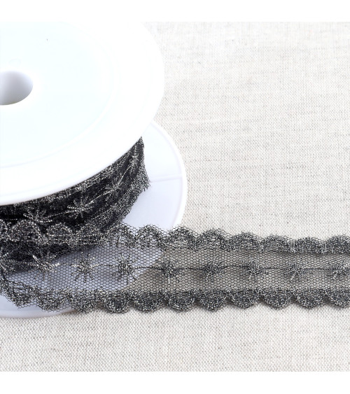 Metallic embroidery on 28mm black/silver tulle per meter