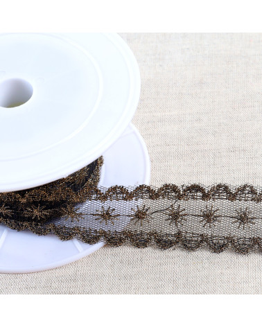Metallic embroidery on 28mm black/gold tulle per meter