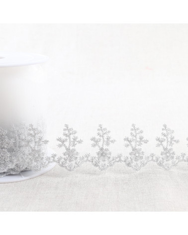 Metallic embroidery on 80mm silver tulle per meter
