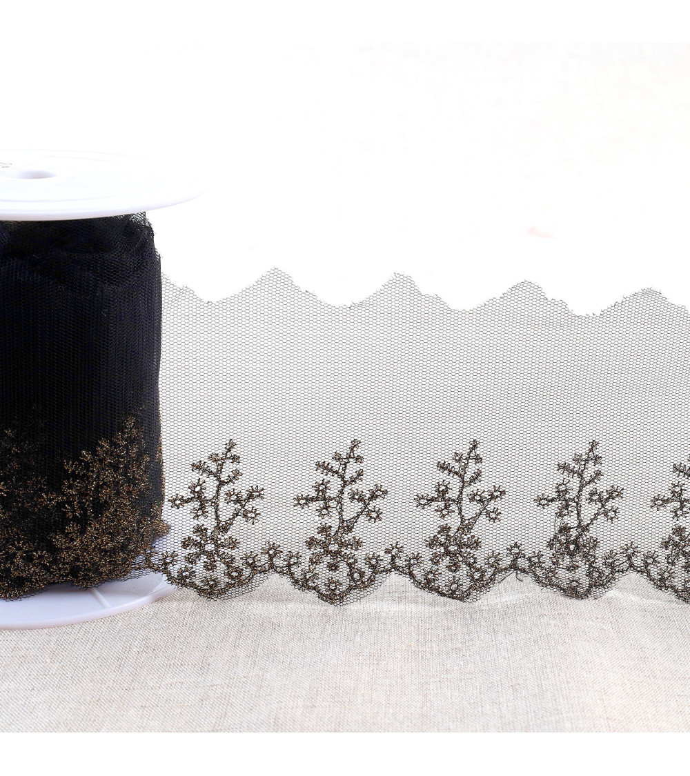 Metallic embroidery on 80mm black/gold tulle per meter