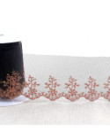 Broderie métallique sur tulle 80mm noir/or/rose au mètre