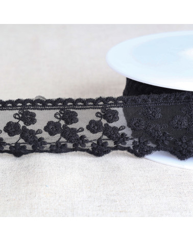 Spool of 13.5m embroidered tulle with small matt flowers 44mm black