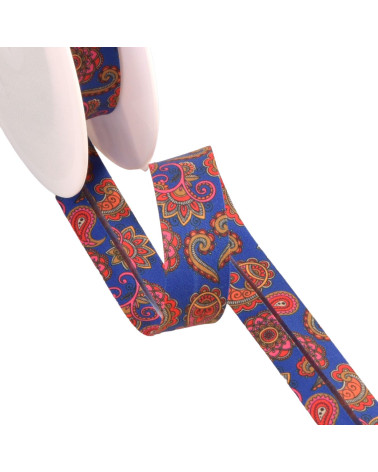 Spool of 25m bias binding with royal blue paisley pattern 20mm