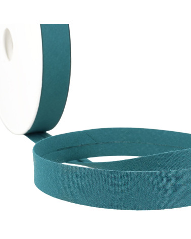 Folded bias all teal blue fabric by the meter made in France