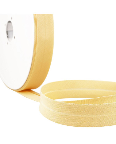 Bias folded all light yellow textile by the meter made in France