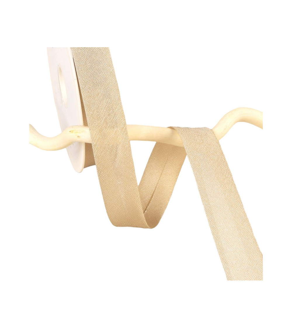 Spool of 25m of iridescent beige metal bias binding 20mm