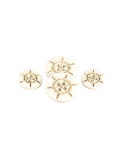Ivory colored plastic rudder button
