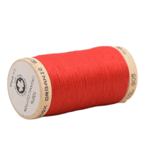 Spool of 100% organic cotton thread 275m red