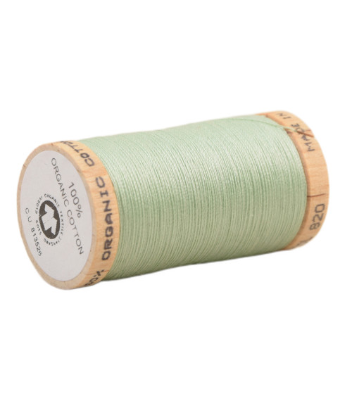 Spool of 100% organic cotton thread 275m water green