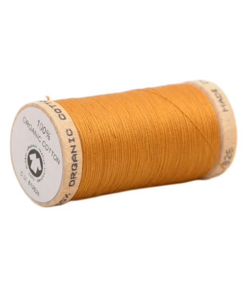 Spool of 100% organic cotton thread 275m old gold