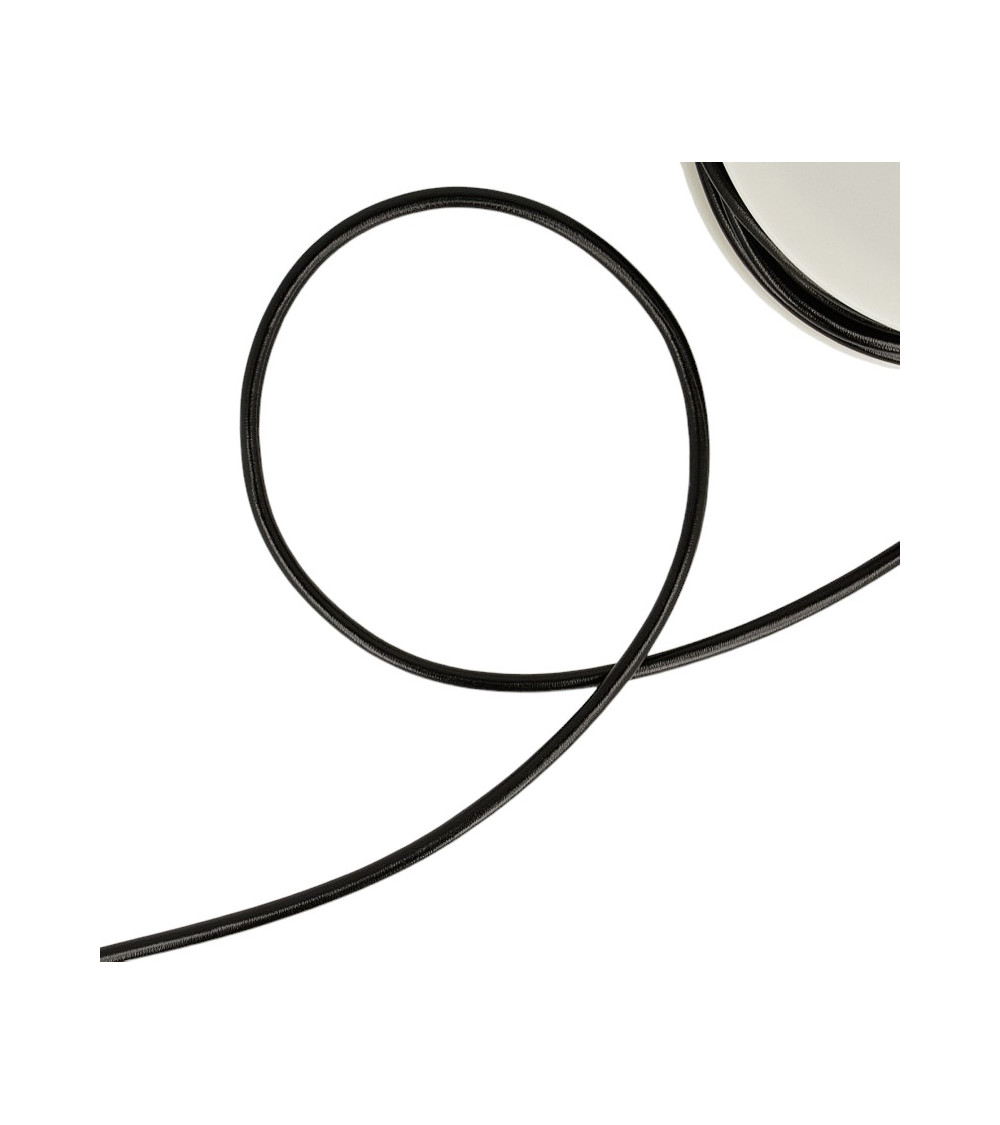Black faux metal cord reel