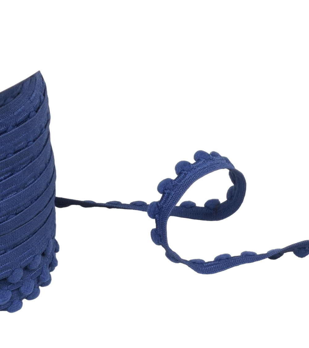 25m spool of elastic with navy blue pompoms 13mm