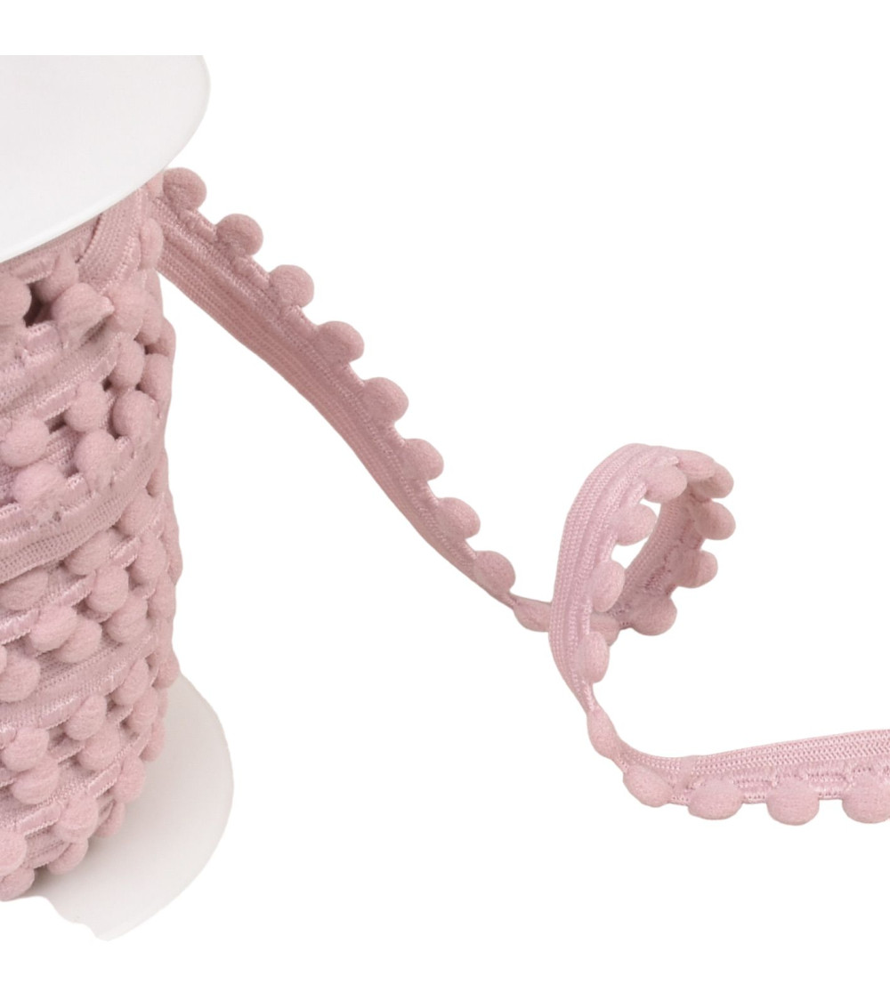 25m spool of elastic with old pink pompoms 13mm