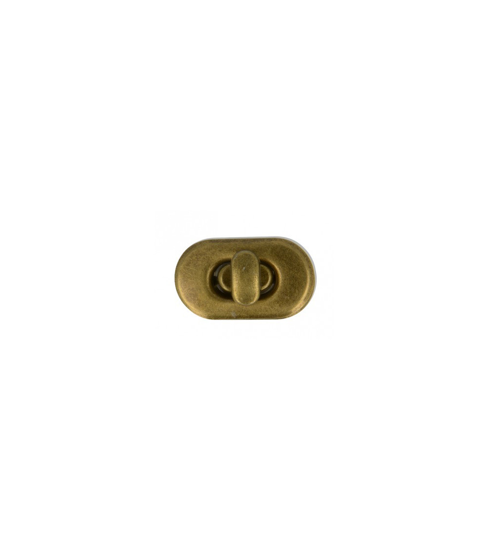 Turnstile clasp for antique gold colored bag