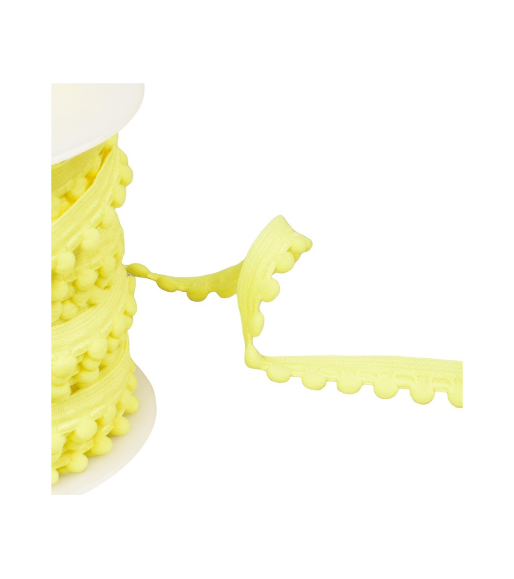 Bobina da 25 m di elastico con pompon gialli da 13 mm
