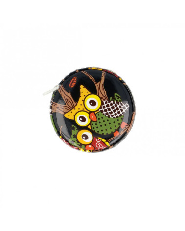 Yellow owl tape measure on black background