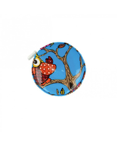 Orange owl measuring tape on blue background