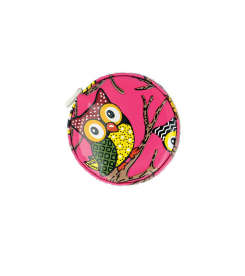 Pink owl measuring tape on black background