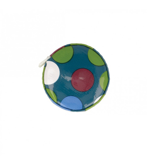 Polka dot tape measure on blue background