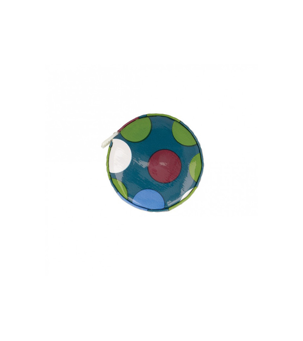 Tape measure with polka dots on blue background