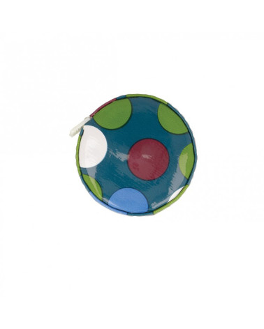 Tape measure with polka dots on blue background