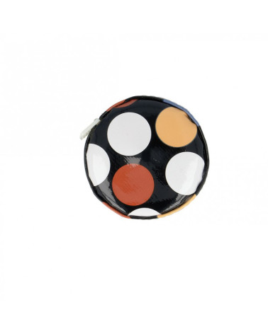 Tape measure with polka dots on black background