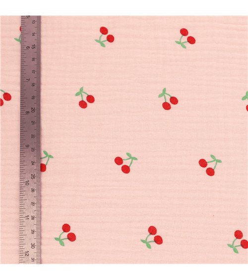 Tissu double gaze imprimée cerise fond rose au mètre
