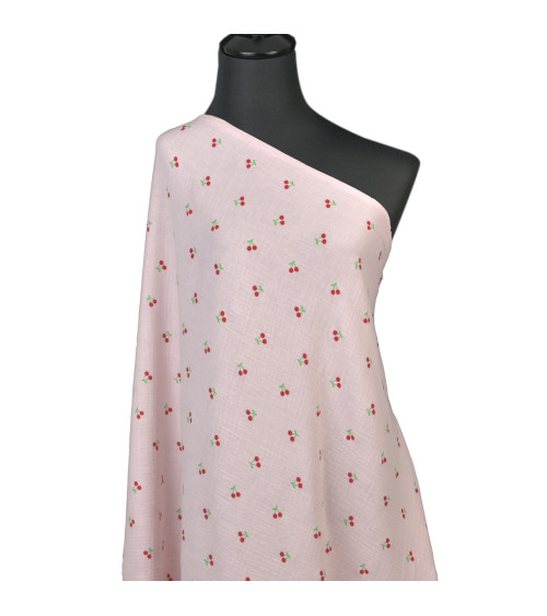 Cherry printed double gauze fabric with pink background by the meter